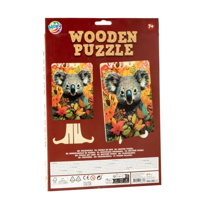Kvalitetni drveni dijelovi puzzle Koala MOXY na stolu za slaganje