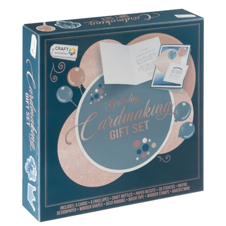 Set za cardmaking Happy birthday sa raznobojnim papirima, pečatima i ukrasima za izradu unikatnih rođendanskih čestitki.