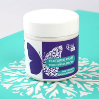 Pogled na poklopac i etiketu Rosa sitnozrnaste strukturirne paste od 150 ml.